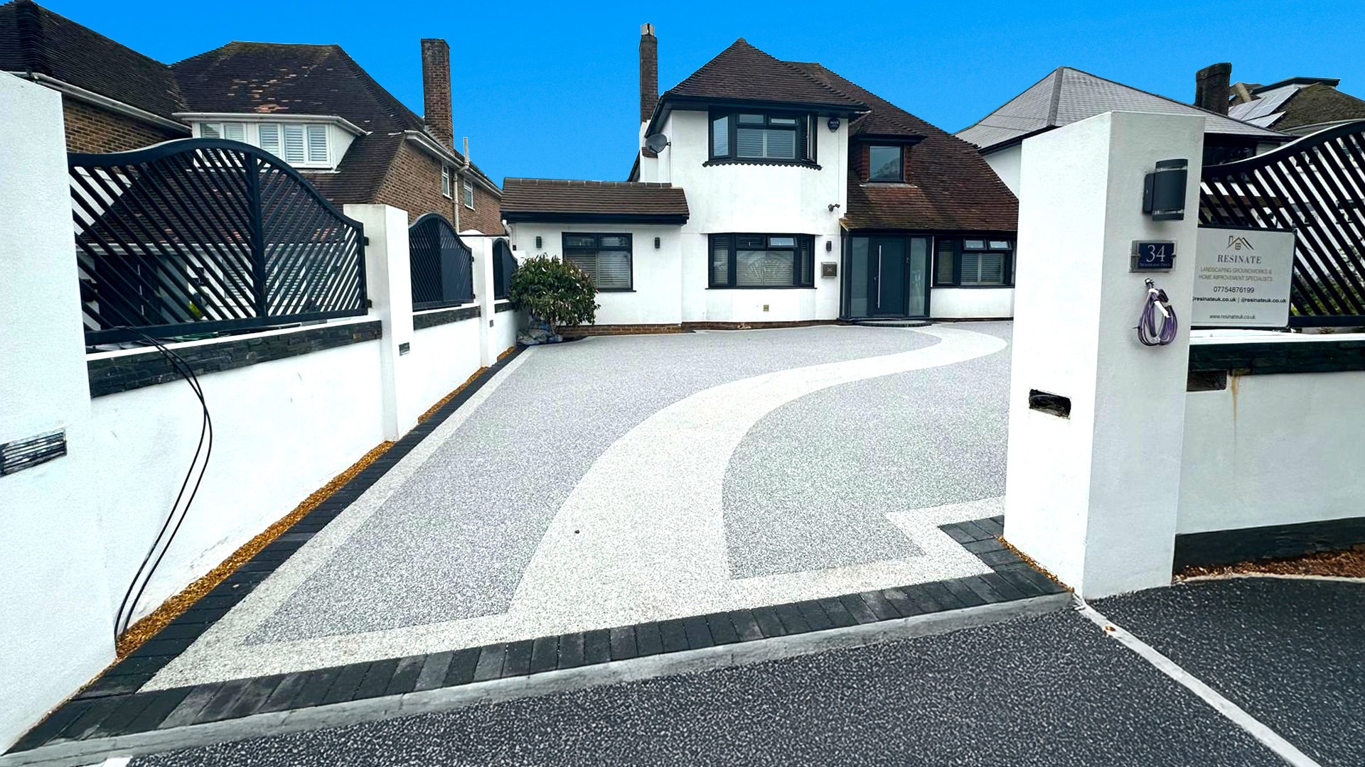 Resinate Surfaces team installing a resin driveway in Dorset